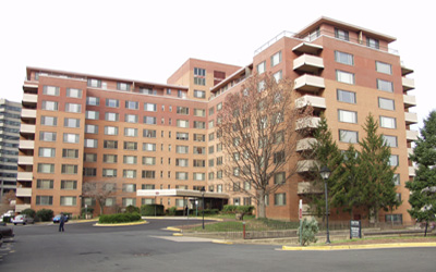 View of one of the 4 buildings that make up the River Place complex Apartment Finder